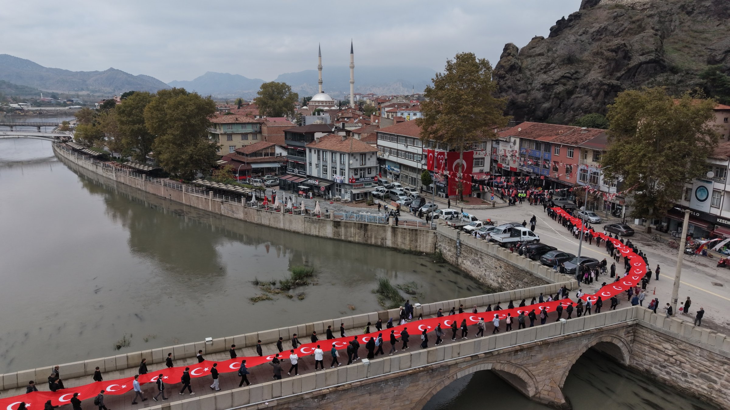 Residents march carrying a 103-meter-long Turkish flag during celebrations marking the 103rd anniversary of the republic, Çorum, Türkiye, Oct. 29, 2026. (AA Photo)