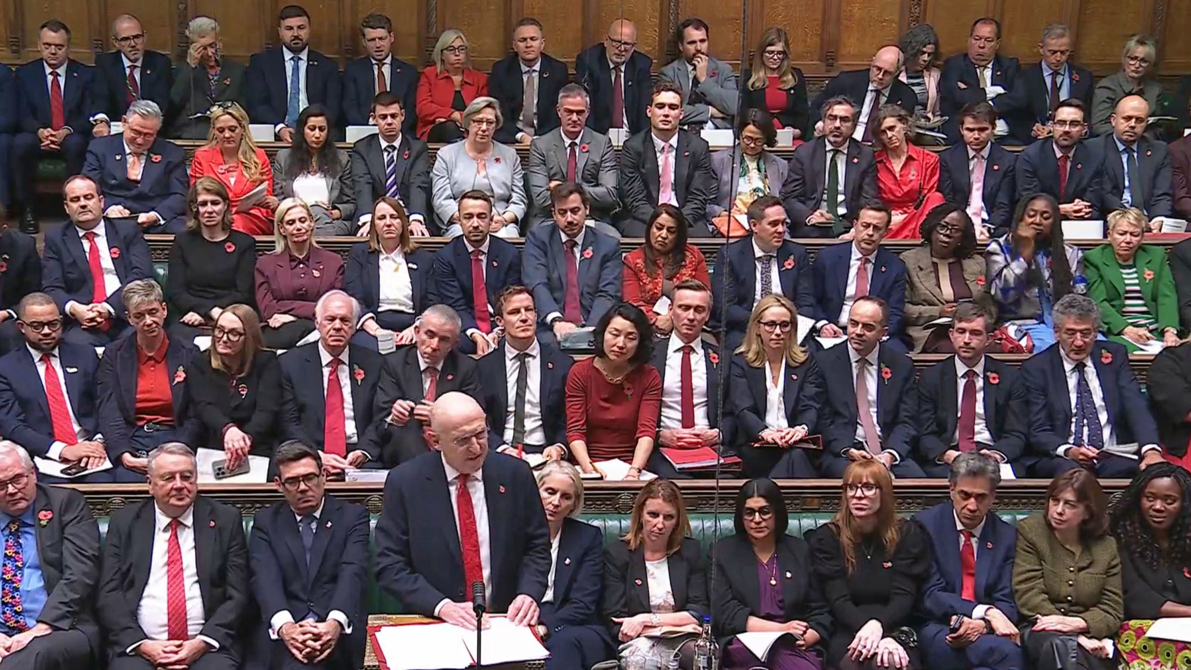 This video grab, taken from footage broadcast by the UK Parliamentary Recording Unit (PRU) via the Parliament TV website, shows Britain's Chancellor of the Exchequer John Healey as he presents the budget in the House of Commons in London, U.K., Oct. 28, 2026. (AFP Photo)