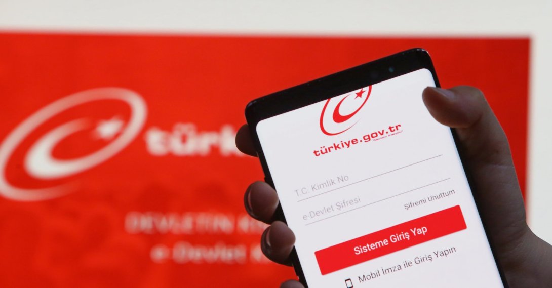 The e-Government Gateway ("e-Devlet") logo appears on a computer screen and a mobile phone, Istanbul, Türkiye, April 6, 2026. (Shutterstock Photo)