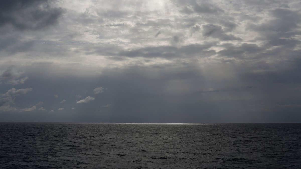 The sun shines over international waters north of Libya, Sept. 8, 2019.  (AP Photo)