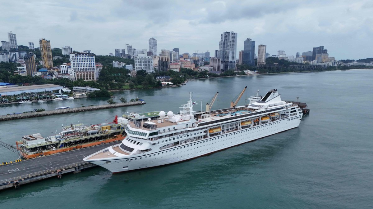 An aerial view shows the Villa Vie Residences' cruise ship Odyssey docked at Sihanoukville port in Preah Sihanouk province, Cambodia, Oct. 29, 2026. (AFP Photo)