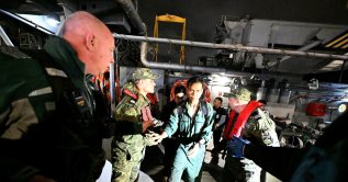 Crew members from a ship damaged in a drone attack disembark from a Bulgarian border police vessel in Varna, Bulgaria, following a rescue operation after sea drones struck a container ship off Bulgaria's Black Sea coast, Oct. 28, 2026. (Reuters Photo)