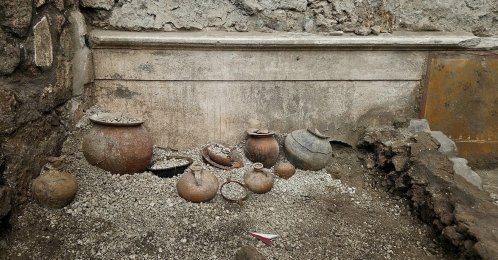 Pottery and other artifacts in the remains of a cupboard uncovered during archaeological excavations in Pompeii, Italy, Oct. 29, 2026. (Reuters Photo)