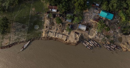 This aerial photograph shows the eroded Padma river embankment at Namo Jagannathpur village, Rajshahi division, Bangladesh, Oct. 12, 2026. (AFP Photo)
