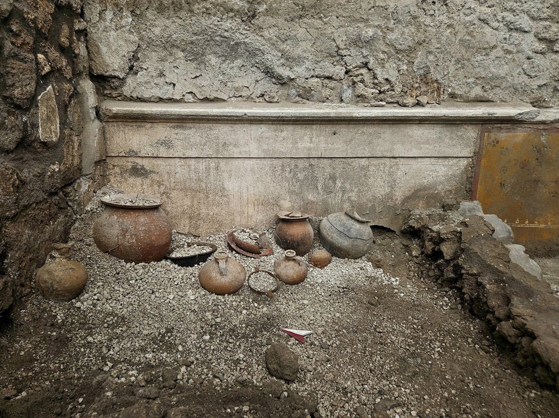 Pottery and other artifacts in the remains of a cupboard uncovered during archaeological excavations in Pompeii, Italy, Oct. 29, 2026. (Reuters Photo)