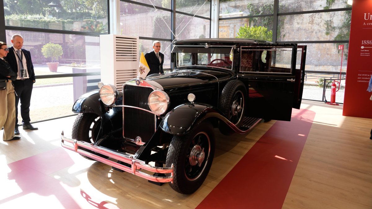 A popemobile used by successive popes is displayed at "A Century of the Popemobile," an exhibition tracing 100 years of papal transportation, from Pope Pius XI's first automobile in 1930 to modern popemobiles, at the Vatican Museums, Vatican, Oct. 28, 2026. (AP Photo)