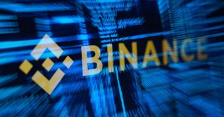 Binance logo and hacker code are seen in this illustration taken Oct. 30, 2026. (Reuters Photo)