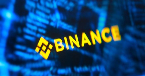 Binance logo and hacker code are seen in this illustration taken Oct. 30, 2026. (Reuters Photo)