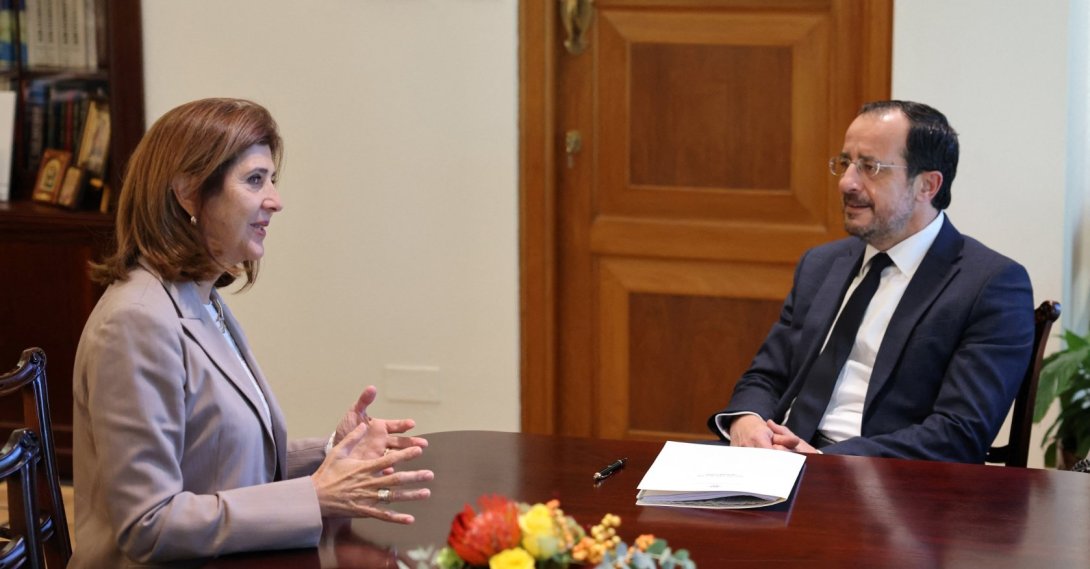 Greek Cypriot leader Nikos Christodoulides and U.N. Secretary-General's Personal Envoy on Cyprus Maria Angela Holguin talk during a meeting, Lefkoşa (Nicosia), island of Cyprus, Oct. 30, 2026. (Reuters Photo)